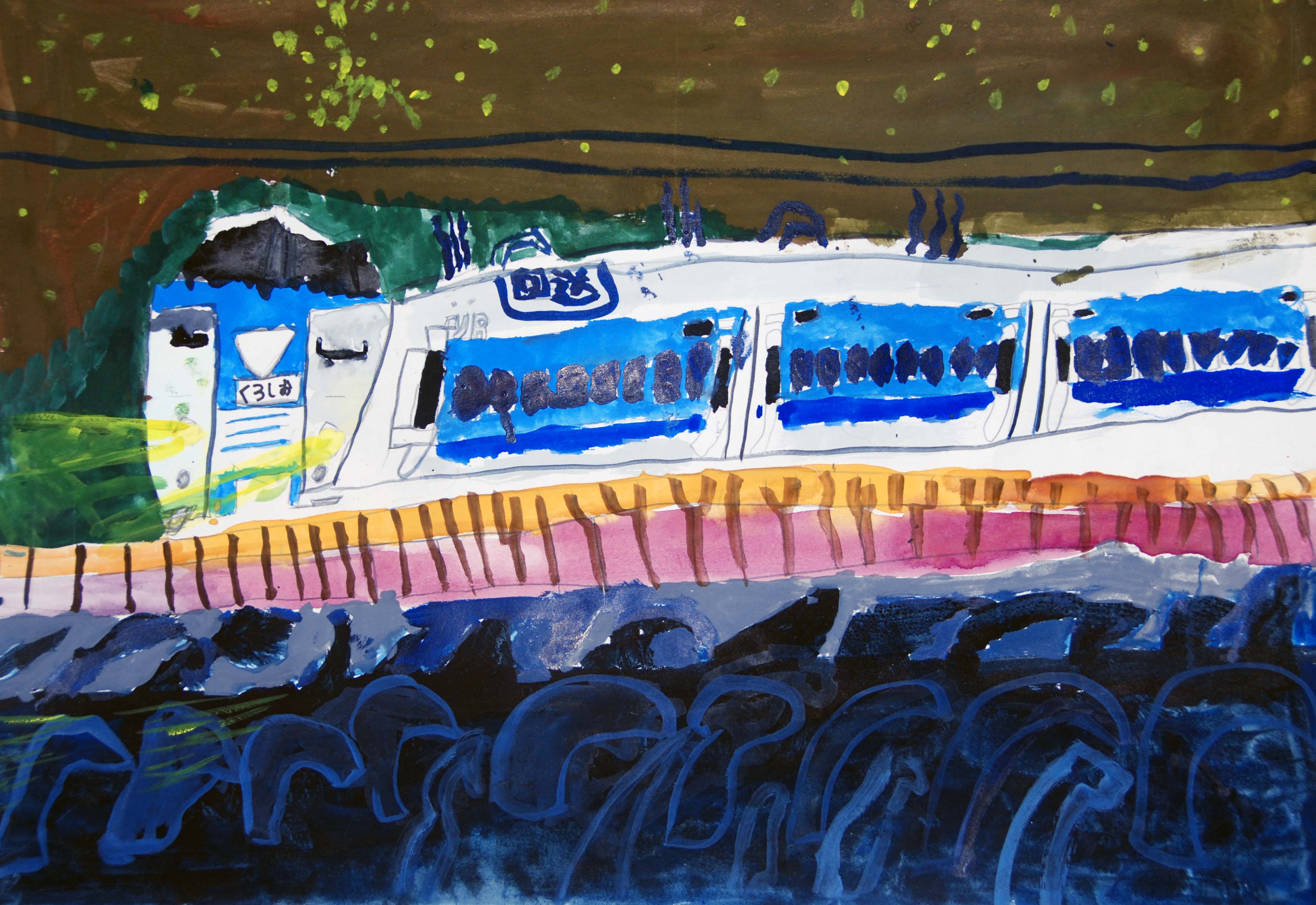 夜の海辺を走る特急くろしお